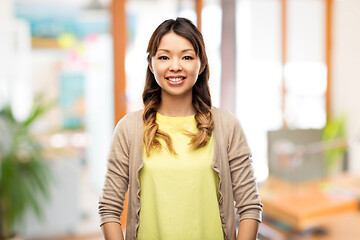 Image showing happy asian woman over background