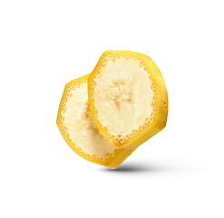 Image showing Cut slices of natural ripe fresh banana fruit isolated on a white background.