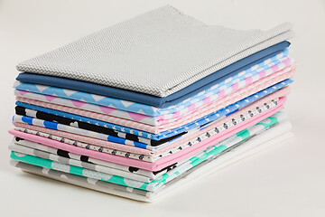 Image showing Stack of cotton fabric material