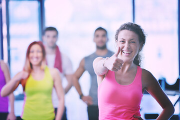 Image showing Group of people exercising at the gym