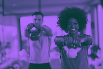 Image showing couple  workout with weights at  crossfit gym