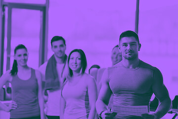 Image showing Group of people exercising at the gym