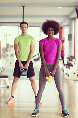 Image showing couple  workout with weights at  crossfit gym