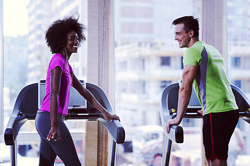 Image showing people exercisinng a cardio on treadmill