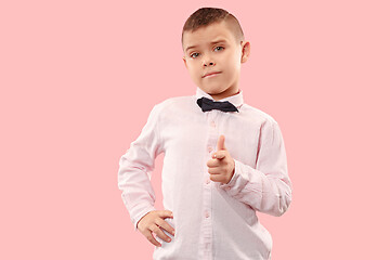 Image showing The teen boy point you. portrait on pink background.