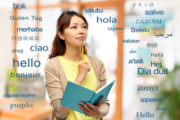 Image showing asian student woman with diary and pencil