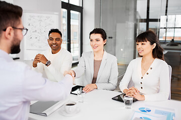 Image showing recruiters having interview with employee