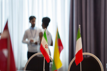 Image showing flags in boardroom at international conference