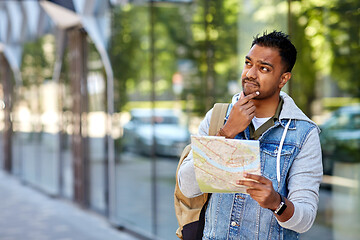 Image showing indian man traveling with backpack and map in city