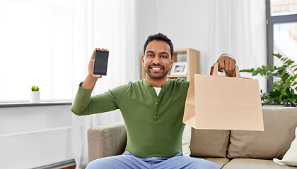 Image showing indian man using smartphone for food delivery