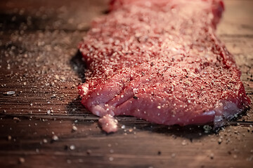 Image showing Mixed pepper and spices on the raw meat steak