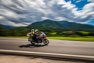 Image showing Tricycle Blurred motion Bikers on the road