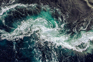 Image showing Waves of water of the river and the sea meet each other during h