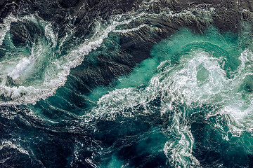 Image showing Waves of water of the river and the sea meet each other during h