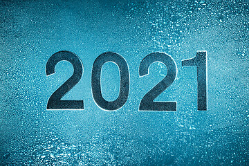 Image showing New Year\'s Eve 2021 Winter background - Frost pattern on the gla