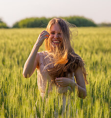 Image showing Portrait of a laughing girl with matted hair