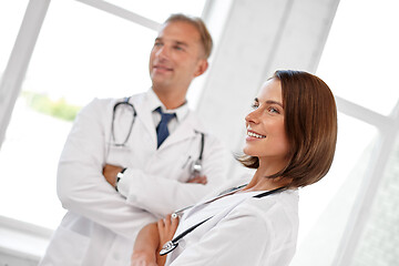 Image showing smiling doctors in white coats at hospital