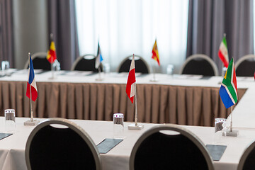 Image showing table in boardroom at international conference