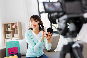 Image showing female beauty blogger making video about make up