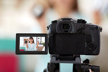 Image showing female beauty blogger making video about make up