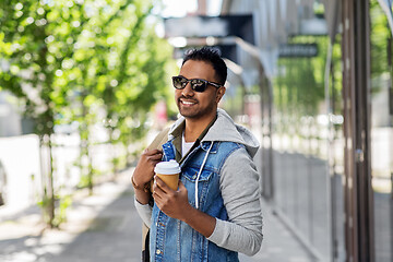 Image showing indian man with bag and takeaway coffee in city