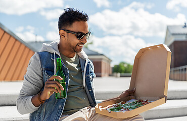 Image showing indian man with pizza and drinking beer outdoors