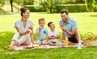 Image showing happy family having picnic at summer park