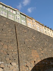 Image showing Brick wall and houses