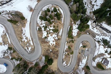 Image showing alpine curvy road on winter top view