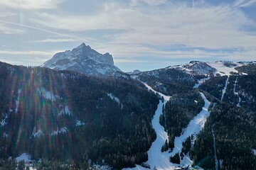 Image showing aerial snow covered mountain peaks in alps at winter 