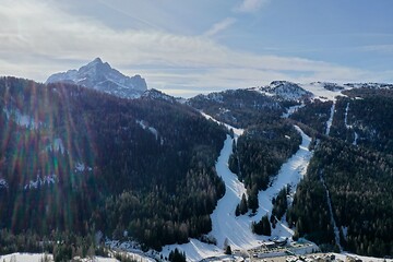 Image showing aerial snow covered mountain peaks in alps at winter 