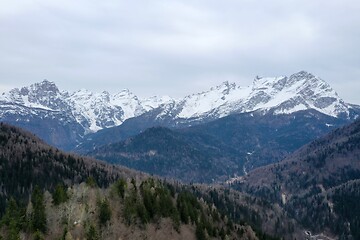 Image showing aerial snow covered mountain peaks in alps at winter 