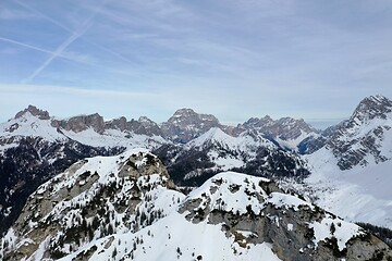 Image showing aerial snow covered mountain peaks in alps at winter 