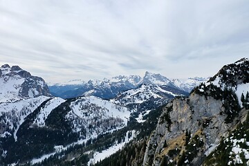 Image showing aerial snow covered mountain peaks in alps at winter 