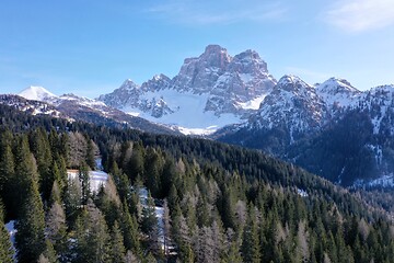 Image showing aerial snow covered mountain peaks in alps at winter 