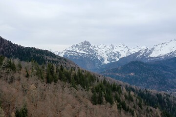 Image showing aerial snow covered mountain peaks in alps at winter 