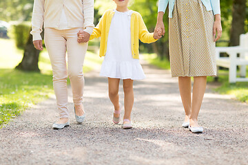 Image showing mother, daughter and grandmother walking at park