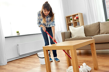 Image showing woman or housewife with mop cleaning floor at home