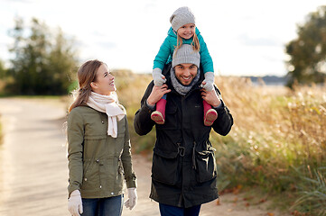 Image showing happy family walking in autumn