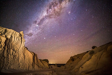 Image showing Night skies over desert landscape