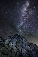 Image showing Views of night sky from tall rocky cliffs