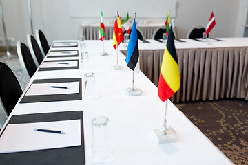 Image showing table in boardroom at international conference