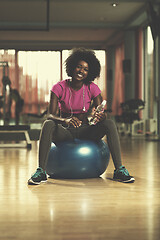 Image showing woman  relaxing after pilates workout