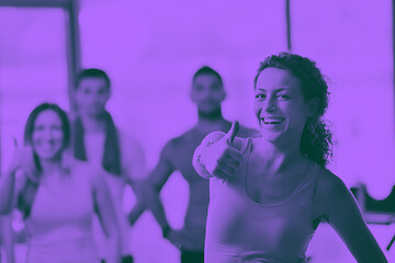 Image showing Group of people exercising at the gym