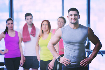 Image showing Group of people exercising at the gym