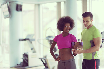 Image showing weights workout with personal trainer at  crossfit gym