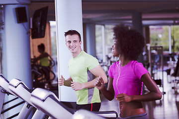 Image showing people exercisinng a cardio on treadmill