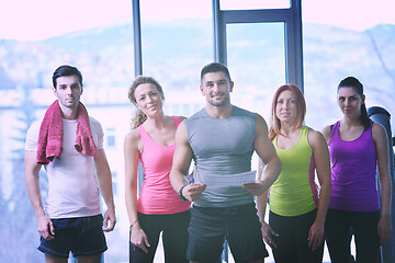 Image showing Group of people exercising at the gym