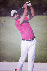 Image showing golfer hitting a sand bunker shot