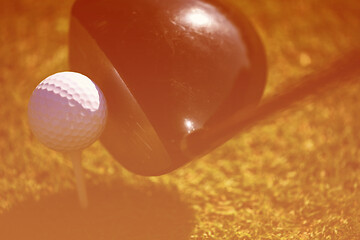 Image showing top view of golf club and ball in grass